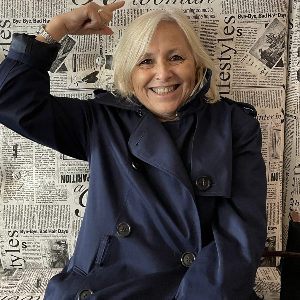 Portrait of Dr. Beatriz Martini, smiling woman with blonde hair